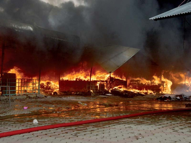 fire engulfed the weekly bazaar in sector h 9 photo mudassar raja express agencies fire engulfed the weekly bazaar in sector h 9 photo mudassar raja express agencies