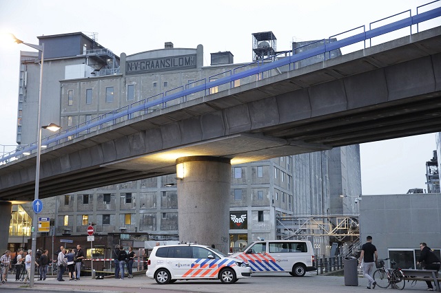 a picture shows a general view as police evacuate the maassilo concert venue after a concert by californian ban allah las was canceled in relation to a terror attack threat according to police and the venue on august 23 2017 in rotterdam photo afp