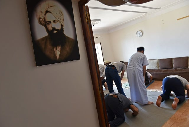 members of algeria 039 s small ahmadi community pray at a house in tilpasi west of algiers photo afp members of algeria 039 s small ahmadi community pray at a house in tilpasi west of algiers photo afp