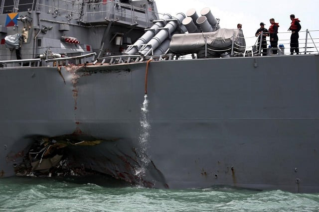 the us navy guided missile destroyer uss john s mccain is seen after a collision in singapore waters august 21 2017 photo reuters ahmad masood the us navy guided missile destroyer uss john s mccain is seen after a collision in singapore waters august 21 2017 photo reuters ahmad masood