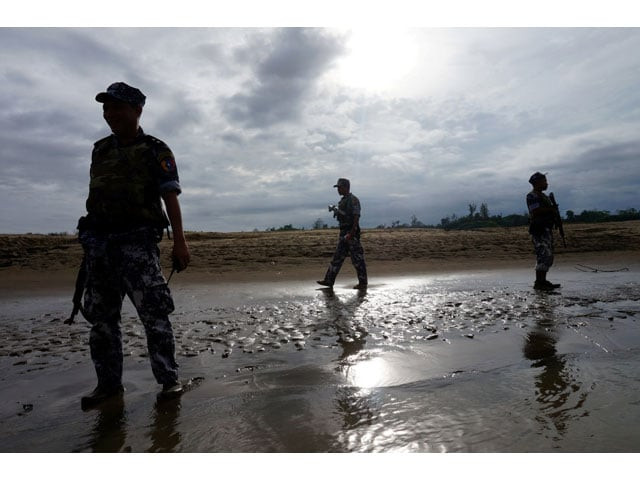 a myanmar border guard police officers stand guard in buthidaung northern rakhine state myanmar july 13 2017 photo reuters a myanmar border guard police officers stand guard in buthidaung northern rakhine state myanmar july 13 2017 photo reuters