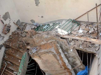 two killed as factory roof caves in two killed as factory roof caves in