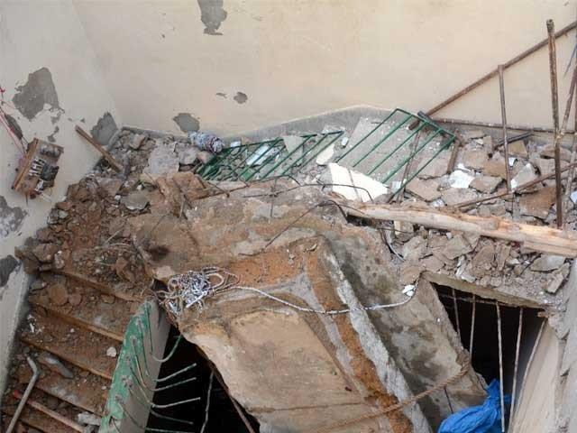 two killed as factory roof caves in