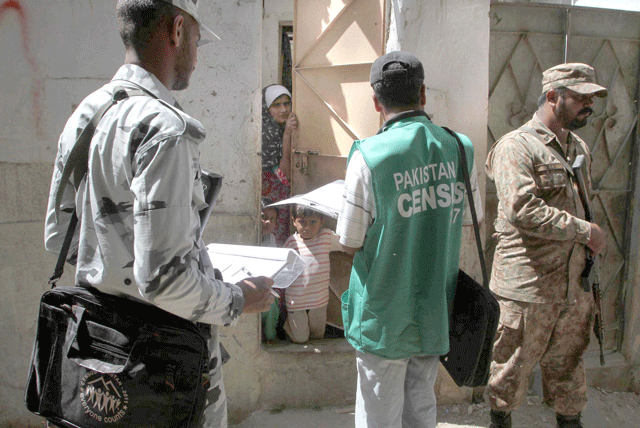 a census team in karachi photo express file