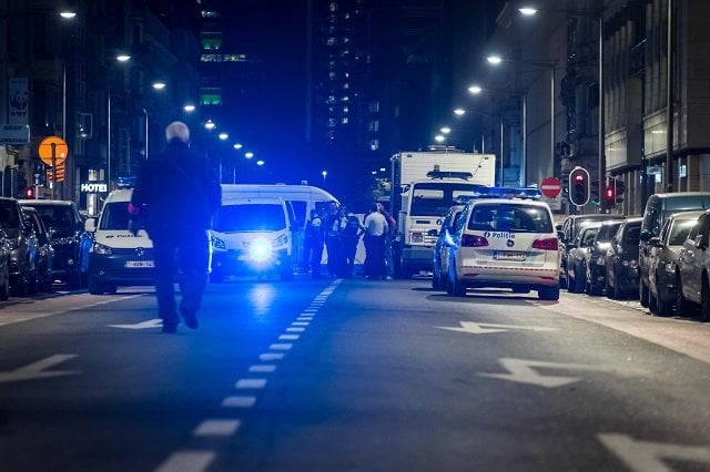 policemen stand guard the boulevard emile jacqmain   emile jacqmainlaan in the city centre of brussels on august 25 2017 where a man is alleged to have attacked soldiers with a knife and was shot a knife wielding man attacked a soldier in brussels on august 25 2017 before being quot neutralised quot by troops present at the scene belgian authorities said belgian media reported that the man who was rushed to the hospital after the attack had attacked two soldiers injuring one in the face and the other in the hand photo afp