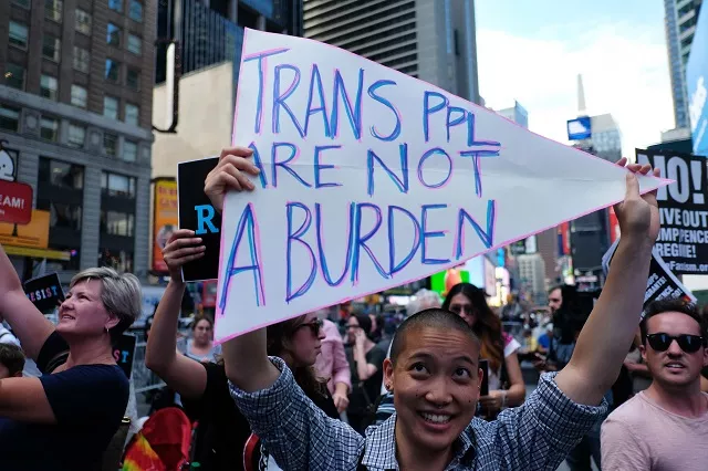 this file photo taken on july 26 2017 shows protesters against us president donald trump during a demonstration in front of the us army career center in times square new york trump on august 25 2017 signed a memo effectively barring transgender people from joining the us military but left the fate of those already serving up to the pentagon photo afp this file photo taken on july 26 2017 shows protesters against us president donald trump during a demonstration in front of the us army career center in times square new york trump on august 25 2017 signed a memo effectively barring transgender people from joining the us military but left the fate of those already serving up to the pentagon photo afp