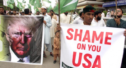 protesters burn us flag effigies of donald trump in multan protesters burn us flag effigies of donald trump in multan