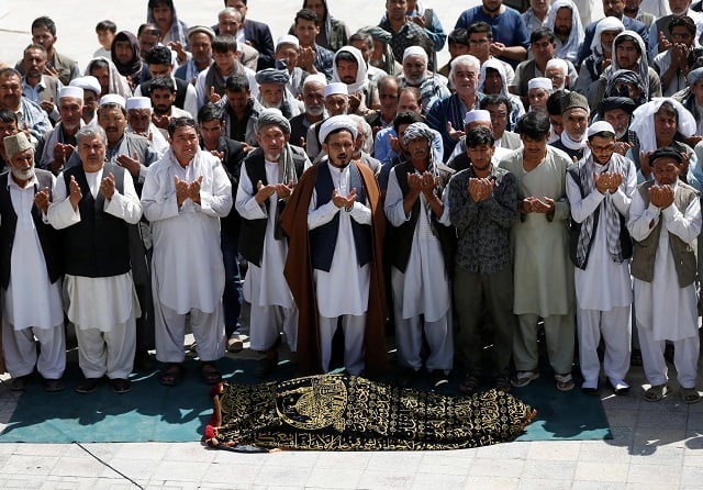 people perform prayers for one of the victims of friday 039 s attack at a shi 039 ite muslim mosque in kabul afghanistan august 26 2017 photo reuters