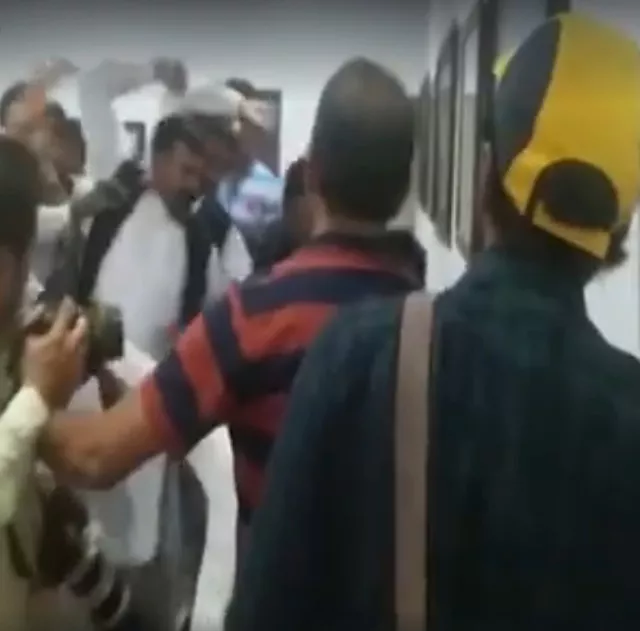 two guards seen on the left hitting someone during the scuffle photo screen grab two guards seen on the left hitting someone during the scuffle photo screen grab