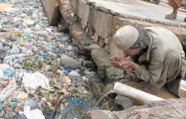 a man drinks water from a pipe installed in a sewage drain near hyderabad railway station the sc constituted the commission to probe the issue of non provision of drinking water and sanitation in sindh photo online a man drinks water from a pipe installed in a sewage drain near hyderabad railway station the sc constituted the commission to probe the issue of non provision of drinking water and sanitation in sindh photo online