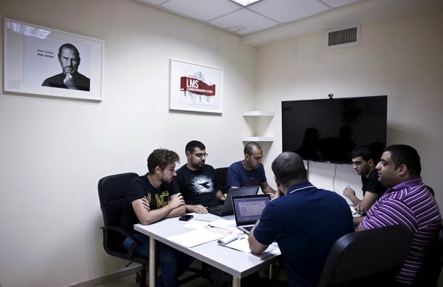 firas jabbour c founder and ceo of start up edunation a social learning platform meets with his team at their offices in nazareth israel june 3 2015 photo reuters