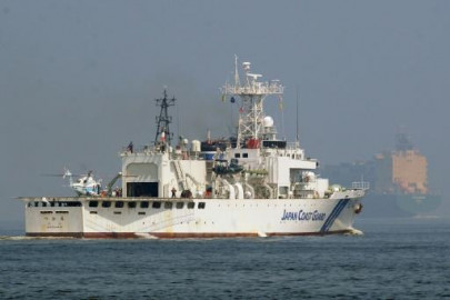 japan searches for crew after navy helicopter accident