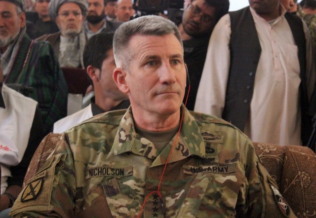 the commander of us and nato forces in afghanistan general john w nicholson sits during his visits from kunduz province afghanistan photo reuters