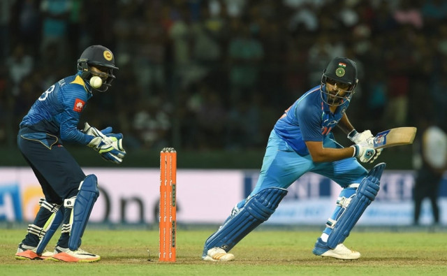 indian cricketer rohit sharma r is watched by sri lankan wicketkeeper niroshan dickwella l as he plays a shot during the third one day international odi cricket match between sri lanka and india at the pallekele international cricket stadium in pallekele on august 27 2017 photo afp indian cricketer rohit sharma r is watched by sri lankan wicketkeeper niroshan dickwella l as he plays a shot during the third one day international odi cricket match between sri lanka and india at the pallekele international cricket stadium in pallekele on august 27 2017 photo afp