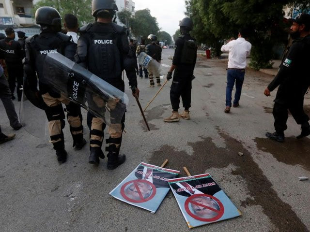 placards are seen left after police dispersed student protesters during a rally in karachi against us president donald trump on august 27 2017 photo reuters