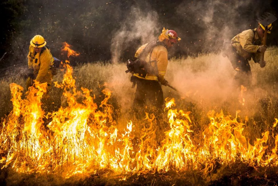 firefighters work to dig a fire photo reuters firefighters work to dig a fire photo reuters