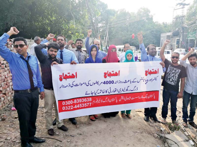 pharmacists shout slogans in favour of their demands photo express