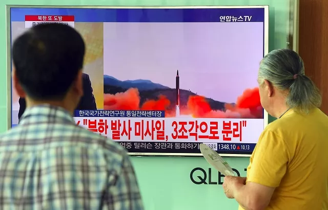 people watch a television news screen showing file footage of a north korean missile launch at a railway station in seoul on august 29 2017 nuclear armed north korea fired a ballistic missile over japan and into the pacific ocean on august 29 in a major escalation by pyongyang amid tensions over its weapons ambitions photo afp people watch a television news screen showing file footage of a north korean missile launch at a railway station in seoul on august 29 2017 nuclear armed north korea fired a ballistic missile over japan and into the pacific ocean on august 29 in a major escalation by pyongyang amid tensions over its weapons ambitions photo afp