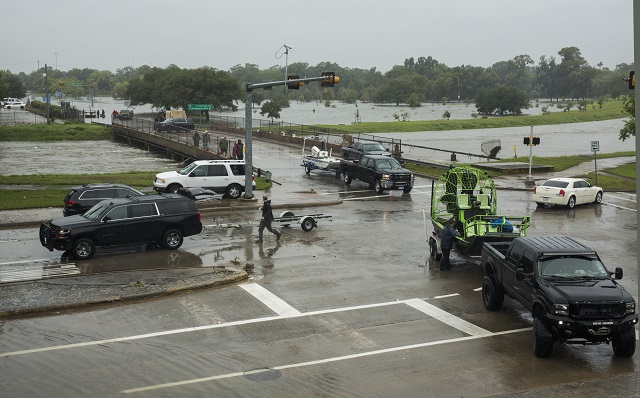 search and rescue volunteers launch their boats near bray bayou and loop 610 to rescue flood victims in the meyerland neighborhood after hurricane harvey inundated the area on august 28 2017 in houston texas harvey which made landfall north of corpus christi late friday evening is expected to dump upwards to 40 inches of rain in areas of texas over the next couple of days photo afp