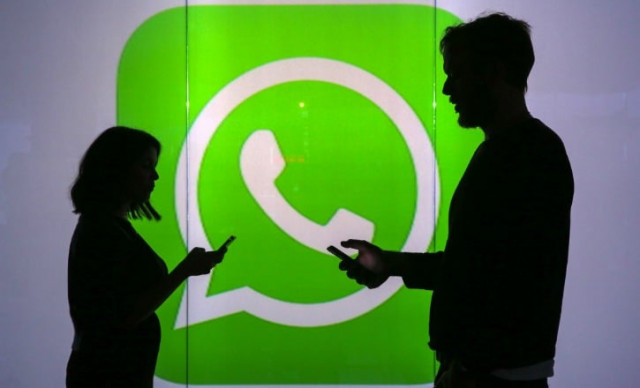 people are seen as silhouettes as they check mobile devices whilst standing against an illuminated wall bearing whatsapp inc 039 s logo in this arranged photograph in london u k on tuesday jan 5 2016 whatsapp inc offers a cross platform mobile messaging application that allows users to exchange messages photo reuters people are seen as silhouettes as they check mobile devices whilst standing against an illuminated wall bearing whatsapp inc 039 s logo in this arranged photograph in london u k on tuesday jan 5 2016 whatsapp inc offers a cross platform mobile messaging application that allows users to exchange messages photo reuters