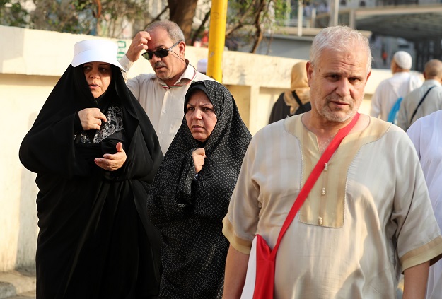 iranian muslim pilgrims head to the grand mosque in the holy saudi city of makkah photo afp