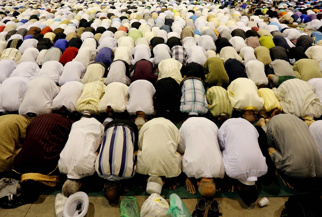 eid prayers held in large congregations throughout the country photo reuters