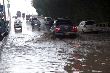 a file photo of flooding street after a heavy rain