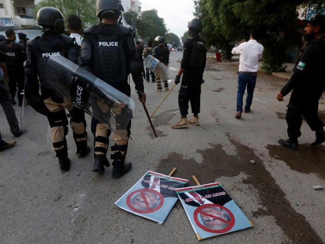 placards are seen left after police dispersed student protesters during a rally in karachi against us president donald trump on august 27 2017 photo reuters placards are seen left after police dispersed student protesters during a rally in karachi against us president donald trump on august 27 2017 photo reuters