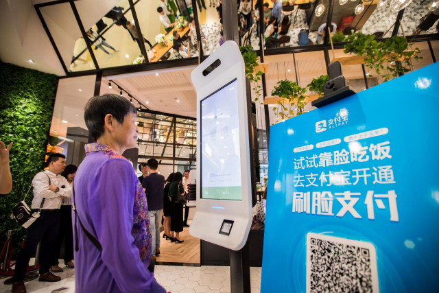 a customer tries alipay 039 s facial recognition payment solution quot smile to pay quot at kfc 039 s new kpro restaurant in hangzhou zhejiang province china september 1 2017 photo reuters a customer tries alipay 039 s facial recognition payment solution quot smile to pay quot at kfc 039 s new kpro restaurant in hangzhou zhejiang province china september 1 2017 photo reuters