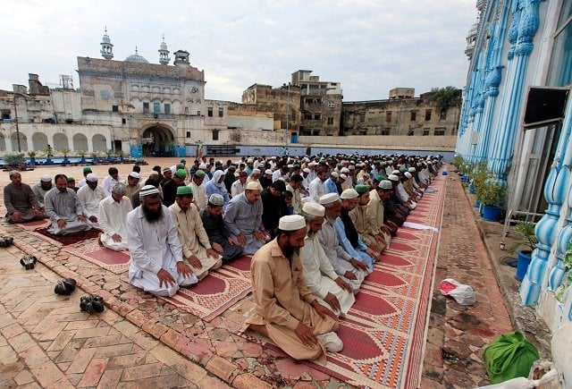 muslims attend the eid al adha prayer at a mosque in rawalpindi photo reuters