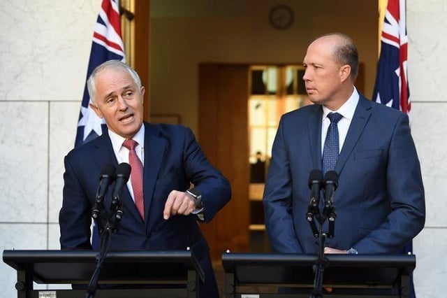 australia 039 s prime minister malcolm turnbull l and minister for immigration and border protection peter dutton speak on australia 039 s citizenship test during a press conference at parliament house in canberra australia april 20 2017 photo reuters