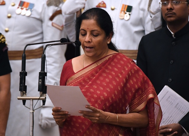 bharatiya janata party bjp politician and member of parliament nirmala sitharaman takes the oath during the swearing in ceremony of new ministers at the presidential palace in new delhi on september 03 2017 photo afp