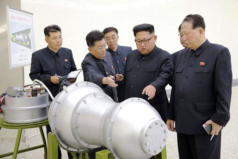 north korea released a photograph on sunday of the country s leader kim jong un center inspecting what it said was a hydrogen bomb that could be fitted onto a missile hours later it carried out its sixth nuclear test photo korean central news agency