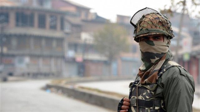 an indian paramilitary trooper stands guard during a clampdown in iok photo afp an indian paramilitary trooper stands guard during a clampdown in iok photo afp