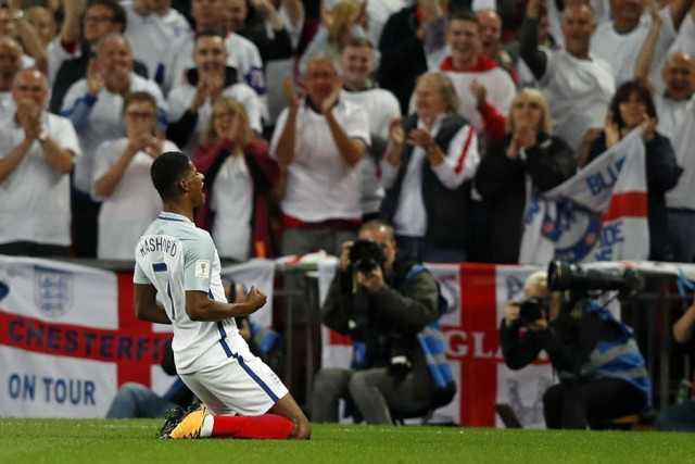 england 039 s striker marcus rashford celebrates scoring england 039 s second goal during the world cup 2018 qualification football match between england and slovakia at wembley stadium in london on september 4 2017 photo afp england 039 s striker marcus rashford celebrates scoring england 039 s second goal during the world cup 2018 qualification football match between england and slovakia at wembley stadium in london on september 4 2017 photo afp