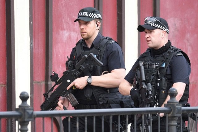 armed police patrol near manchester arena following a deadly terror attack in manchester northwest england photo afp