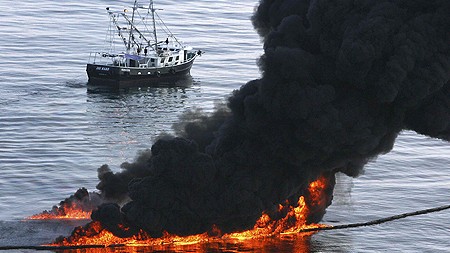 smoke billows from a controlled burn of spilled oil off the louisiana coast photo reuters