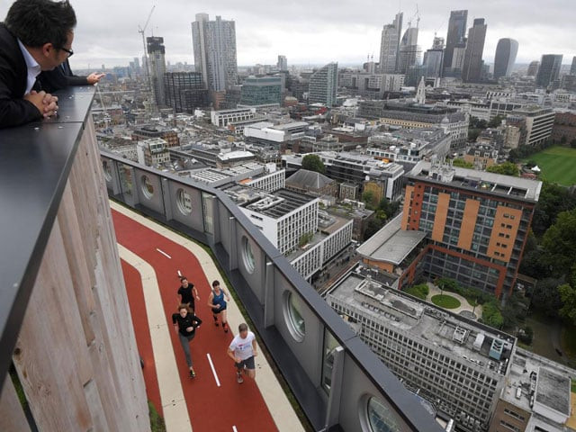 workers pose as they run round a track unveiled as the highest running track in london at the white collar factory in the 039 tech belt 039 hub near old street in london september 5 2017 photo reuters workers pose as they run round a track unveiled as the highest running track in london at the white collar factory in the 039 tech belt 039 hub near old street in london september 5 2017 photo reuters