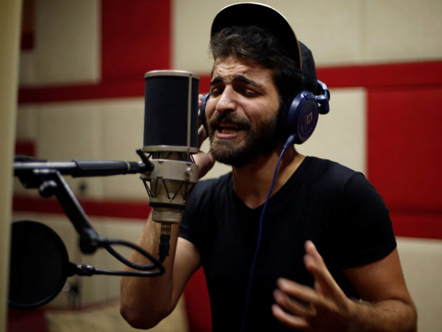 palestinian rapper ibrahim ghunaim mc gaza performs in a studio in gaza city august 16 2017 photo reuters