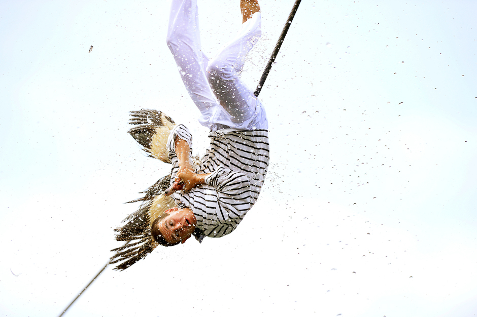 a man attempts to pull the neck off a dead goose while being repeatedly plunged into the water during antzar eguna day of the goose in the basque fishing town of lekeitio near bilbao spain photo reuters