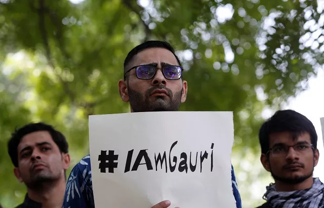 a protester holds a placard during a protest rally against the killing of gauri lankesh an indian journalist in new delhi india september 6 2017 photo reuters a protester holds a placard during a protest rally against the killing of gauri lankesh an indian journalist in new delhi india september 6 2017 photo reuters
