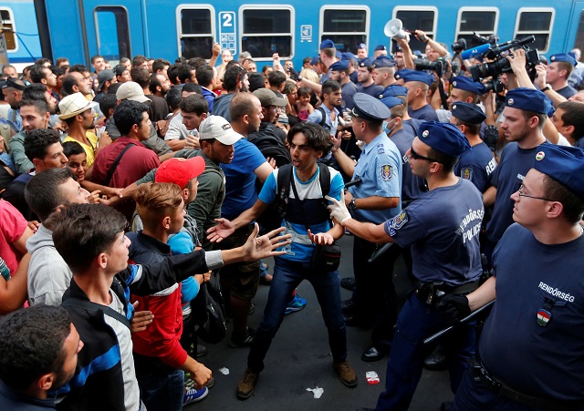 migrants face hungarian police in the main eastern railway station in budapest hungary september 1 2015 photo reuters laszlo balogh file
