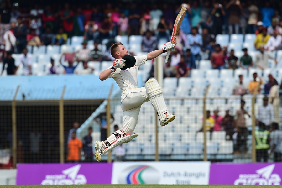 uncharacteristic warner s 20th century was his slowest as the man usually known for his destructive hitting played a superb patient knock to defy the odds photo afp