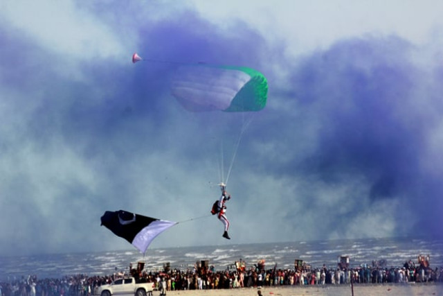 a file photo of paratrooper landing with pakistani flag in the event organised by pakistan navy at karachi s sea view to celebrate defence day photo athar khan a file photo of paratrooper landing with pakistani flag in the event organised by pakistan navy at karachi s sea view to celebrate defence day photo athar khan