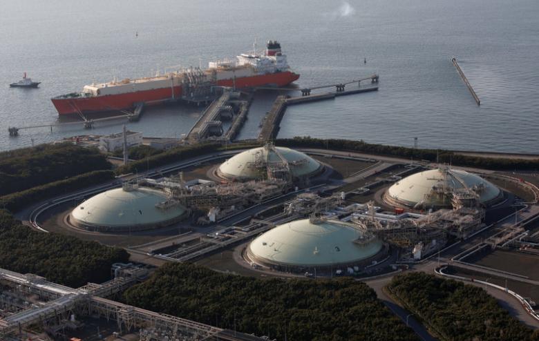 liquefied natural gas lng storage tanks and a membrane type tanker photo reuters