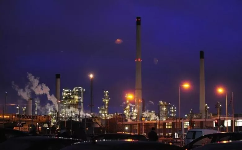 lights shine within an oil refinery photo reuters lights shine within an oil refinery photo reuters