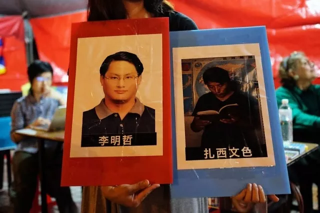 pictures of lee ming cheh left a rights advocate from taiwan and tashi wangchuk an education advocate from tibet during a commemoration last month in taiwan of the 1989 pro democracy crackdown in china photo afp pictures of lee ming cheh left a rights advocate from taiwan and tashi wangchuk an education advocate from tibet during a commemoration last month in taiwan of the 1989 pro democracy crackdown in china photo afp