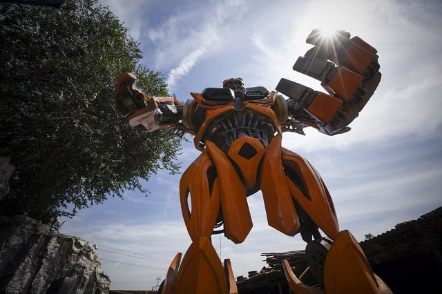 this picture taken on august 29 2017 shows a transformer like sculpture designed by sun shiqian at his studio in beijing sun shiqian 039 s roomy warehouse on the outskirts of beijing houses a hulking menagerie from a sleepy cow to a fiery metal dragon that stands 4 9 metres 16 feet tall at the flip of a switch photo afp this picture taken on august 29 2017 shows a transformer like sculpture designed by sun shiqian at his studio in beijing sun shiqian 039 s roomy warehouse on the outskirts of beijing houses a hulking menagerie from a sleepy cow to a fiery metal dragon that stands 4 9 metres 16 feet tall at the flip of a switch photo afp