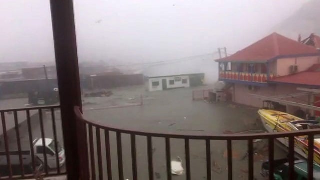 image taken from a video posted on facebook by stefany santacruz showing the view from her balcony as hurricane irma hits the island of st maarteen on september 06 2017 in filipsburg hurricane irma one of the most powerful atlantic storms on record cut a deadly swath through a string of small caribbean islands on wednesday and was on a collision course with puerto rico and potentially south florida photo afp