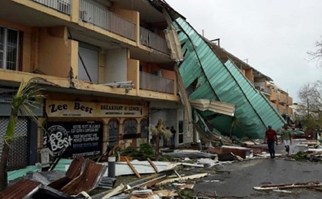 power is cut across st martin as well as supplies of potable water and petrol he said roads are either partly or totally impassable photo afp